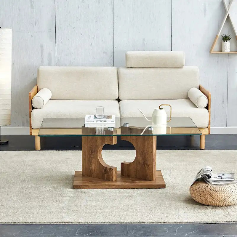 Une table basse rectangulaire moderne et tendance avec un plateau en verre trempé et des pieds en MDF blanc
